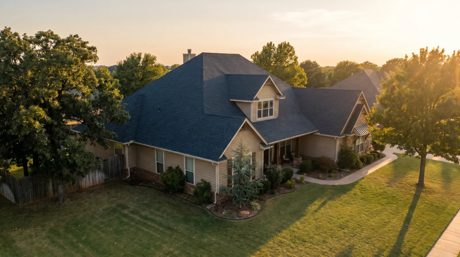 Residential home in an Oklahoma City suburb with a typical architectural-shingle roof