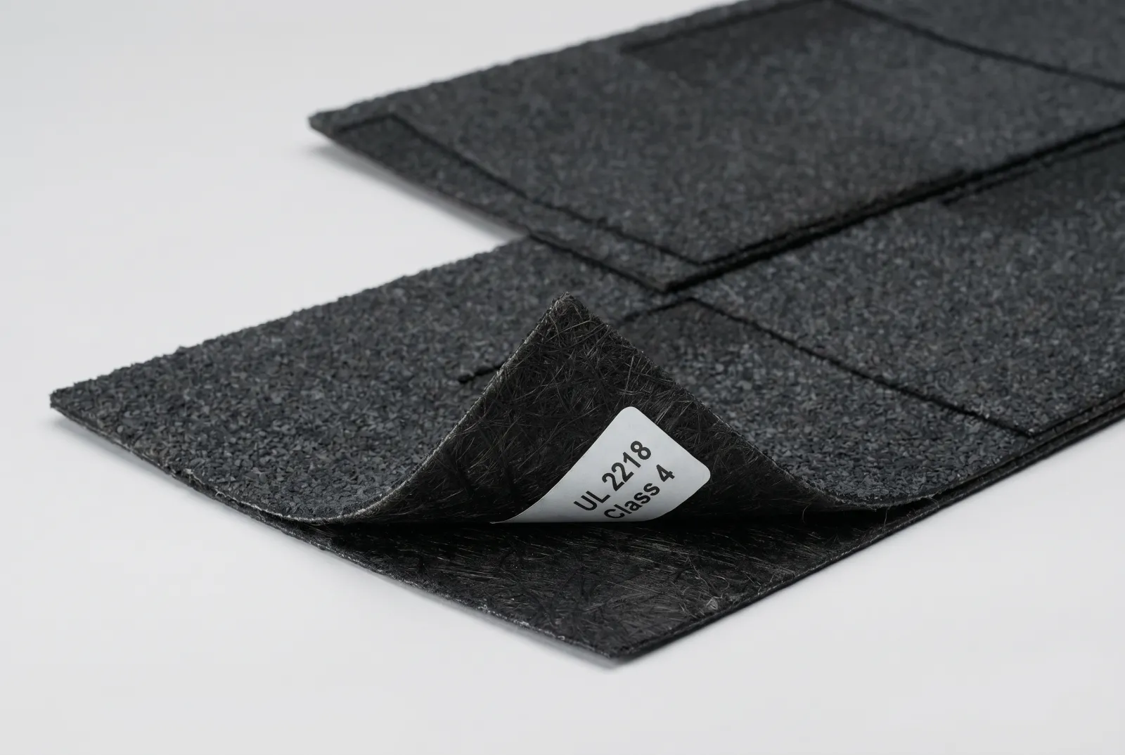 Close-up of a Class 4 impact-resistant asphalt shingle installed on an Oklahoma City home
